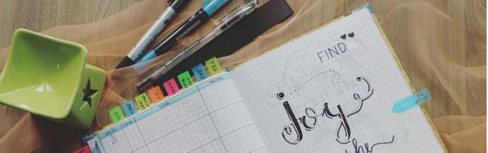 picture of a planner and some markers