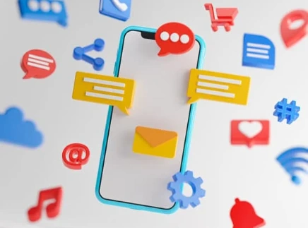 cell phone surrounded by like and text icons