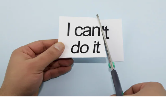 post it reading i cant do it with scissors cutting off the letter t in cant