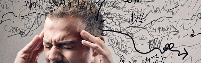 man with negative thought as scribbles around his head